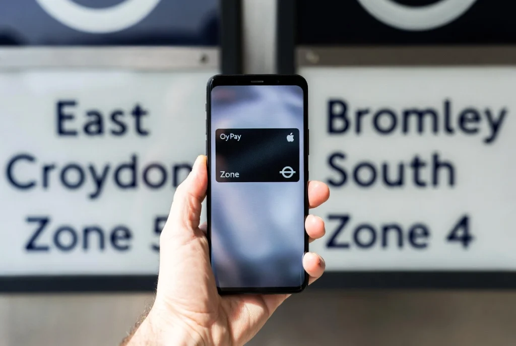 An Oyster card and a London Tube map showing the distance between Croydon and Bromley stations.